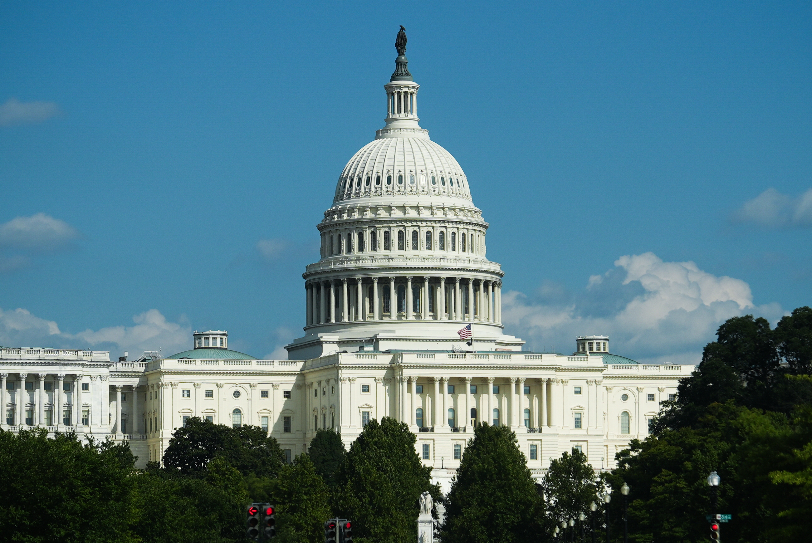 The U.S. Capitol is seen from Pennsylvania Avenue, on Aug. 30. The House voted Tuesday to extend government funding past this fall